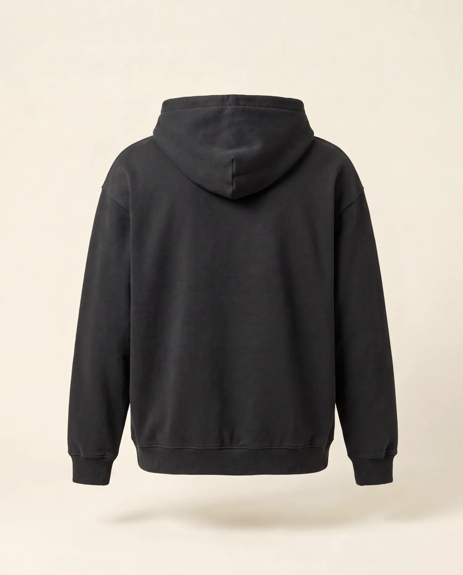 A Hoodie in Charcoal with Tahuri across the back